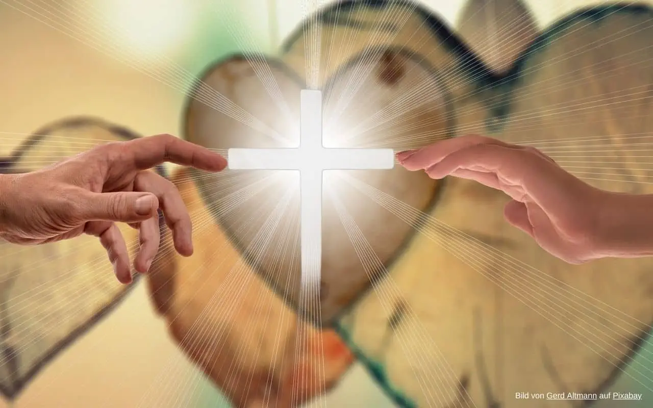 Finger berühren ein Kreuz